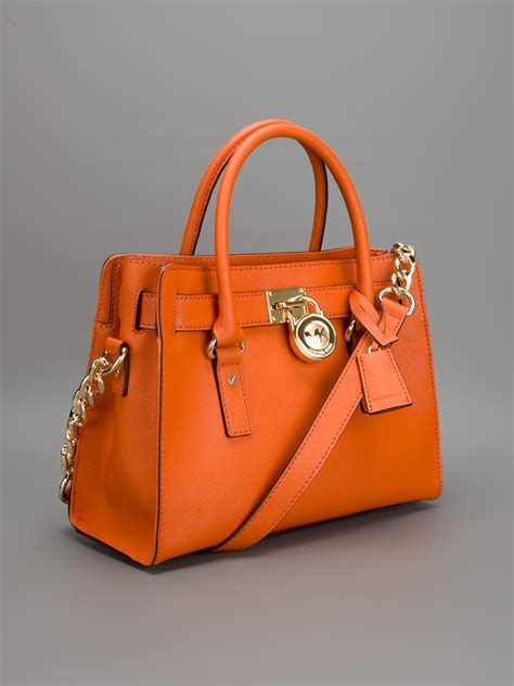 neon orange michael kors bag|michael kors purses orange.